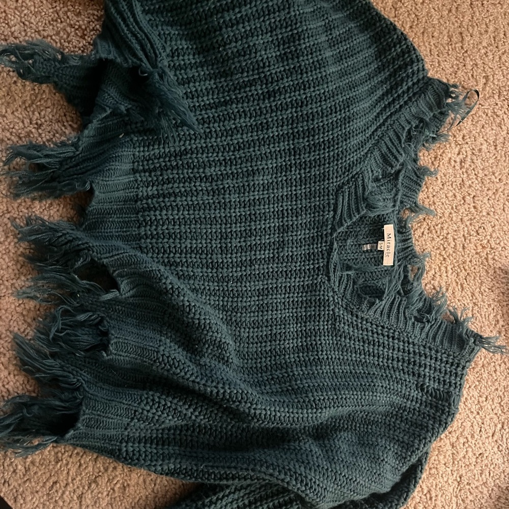 Ripped sweater